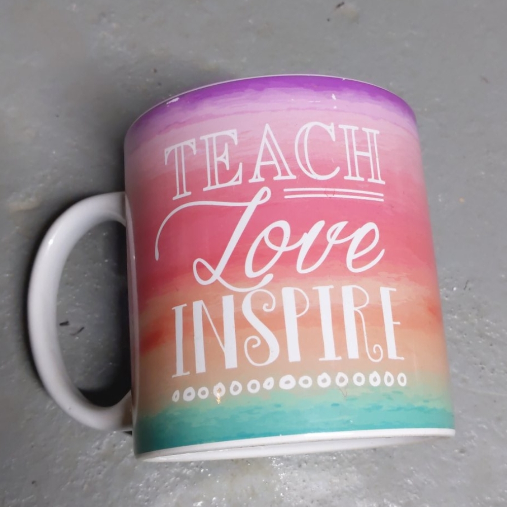 Tmd holding mug